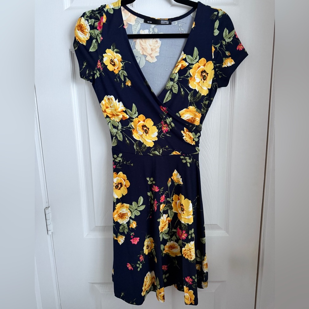Never worn: Crossover V neck navy blue and yellow floral mini dress